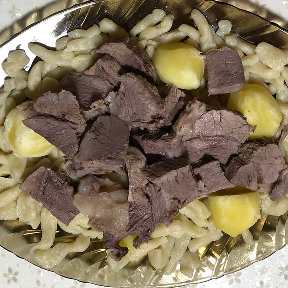 Chechen Zhizhig Galnash with Garlic Sauce Recipe Kitchen Stories