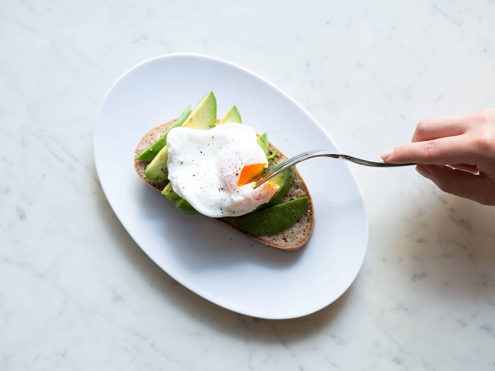 Poached eggs on avocado toast Recipes Kitchen Stories